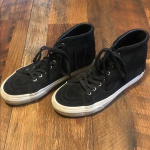 Black high tops Vans with fringe
